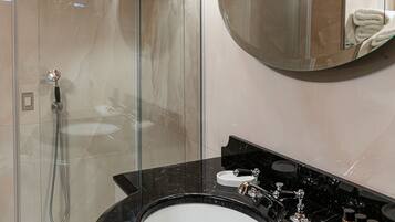 Combined shower/bathtub, hair dryer, towels, soap