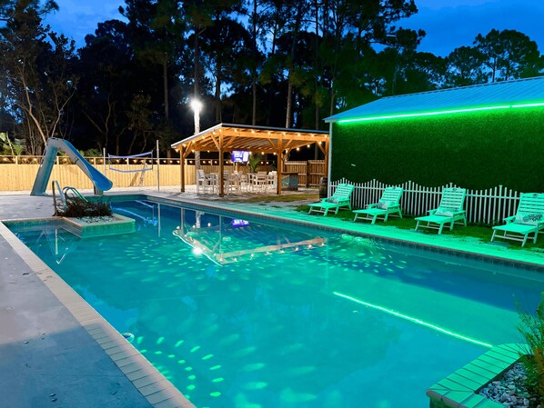 Outdoor pool, a heated pool - The Rustic Resort - 2 Homes, Pool, Building, Golf! Sleeping for up to 30! (Jupiter)