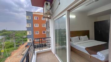 Family Room, Garden View | Balcony view