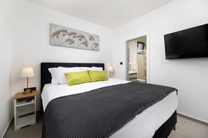 2 dormitorios, tabla de planchar con plancha, wifi gratis y ropa de cama