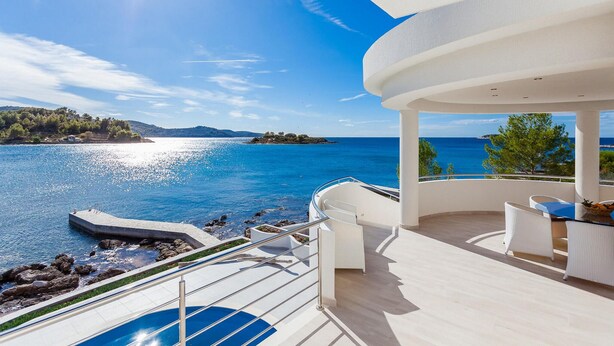 A modern outdoor deck with a pool, overlooking a clear blue sea and a distant island. - Amazing home in Gradina (Gradina)