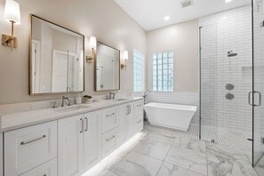 Shower, jetted tub, hair dryer, towels