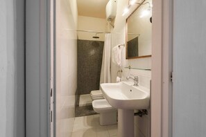 Regadera y secadora de cabello 