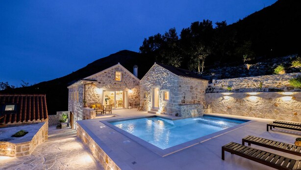 A stone villa with a swimming pool, outdoor seating, and a stone wall. - Villa Mediterranean Estate (Uskoplje)