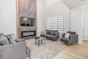 TV, fireplace - Kozy In Keswick (Upper Suite) (Edmonton)