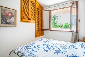 2 habitaciones, tabla de planchar con plancha y internet 