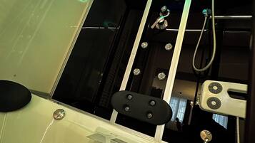 Jetted bath, hair dryer, towels, soap