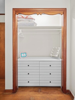 A white dresser with drawers and a mirror, set against a wooden frame. - Ray's Mtn Retreat ~ Hot Tub+Fire Pit, WiFi, Grill! (Green Mountain)