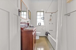 Shower, hair dryer, towels, shampoo