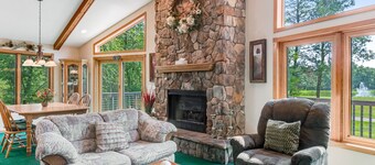 Golf course-front home with 2 pools, private beach, boat launches, tennis, grill