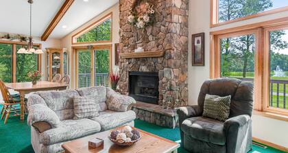 Golf course-front home with 2 pools, private beach, boat launches, tennis, grill