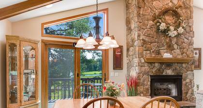 Golf course-front home with 2 pools, private beach, boat launches, tennis, grill