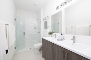 Hair dryer, towels, soap, shampoo