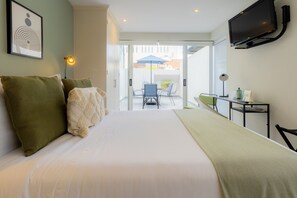 Premium Studio, Terrace | In-room safe, desk, laptop workspace, iron/ironing board