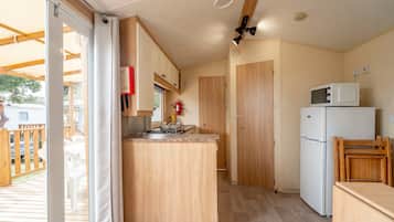 Réfrigérateur, micro-ondes, plaque de cuisson, cafetiÚre/bouilloire