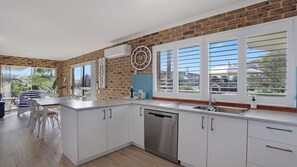 Microwave, dishwasher, dining tables