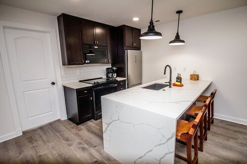 Right across from Bill Snyder Stadium w/ parking! Family size condo. 