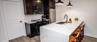 Right across from Bill Snyder Stadium w/ parking! Family size condo. 