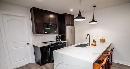 Right across from Bill Snyder Stadium w/ parking! Family size condo.