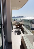 Panoramic Suite, 2 Bedrooms, Beach View | Down comforters, iron/ironing board, free WiFi, bed sheets