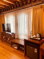 Premium bedding, down comforters, memory foam beds, minibar