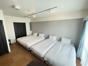 家庭四人房 | 遮光布/窗簾、免費無線上網、床單