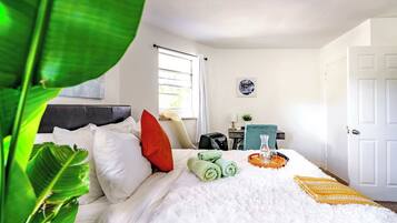 1 bedroom, desk, iron/ironing board, travel crib