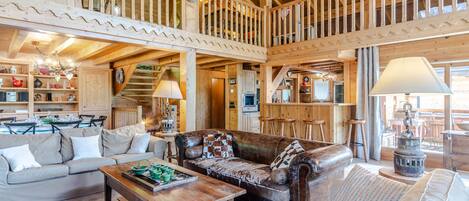 Televisie, een open haard en een kantoor