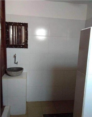 Dutxa, bidet, tovalloles i sabó 