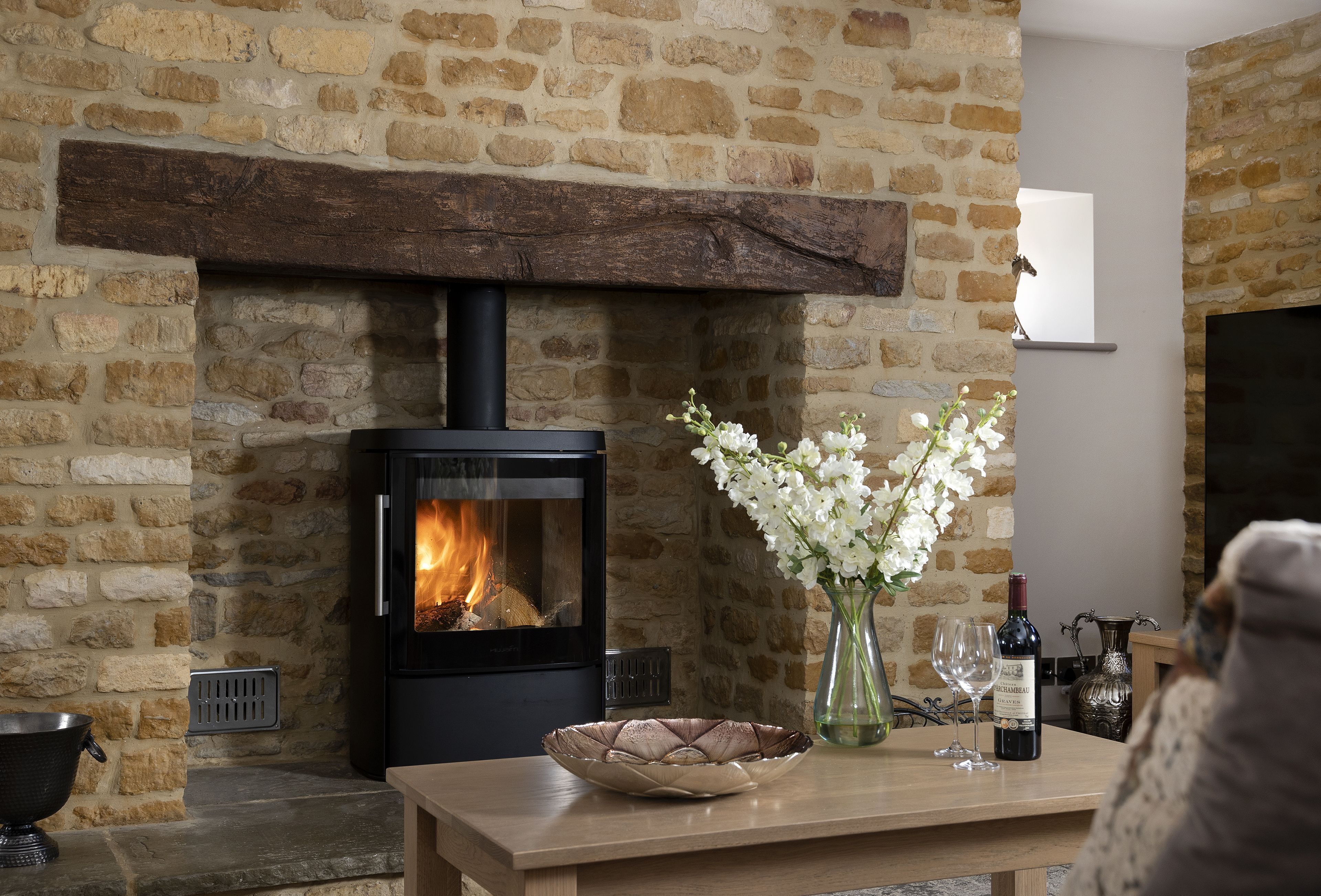 Sitting room with cosy wood burning stove