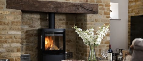 Sitting room with cosy wood burning stove