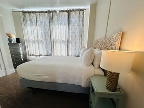 2 bedrooms, desk, iron/ironing board, travel crib