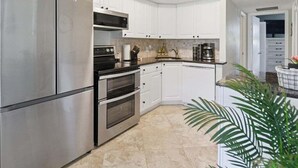Private kitchen - 2BR waterfront Marco Island condo with pool, WiFi, and heated pool. (Marco Island)