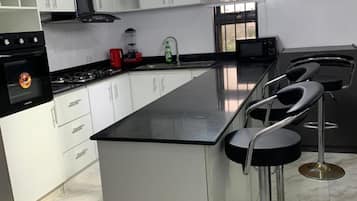 Apartment | Private kitchen | Fridge, microwave, oven, stovetop