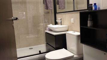 Hair dryer, towels, soap, shampoo