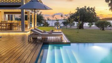 Outdoor pool, open 7:00 AM to 7:00 PM, pool umbrellas, sun loungers