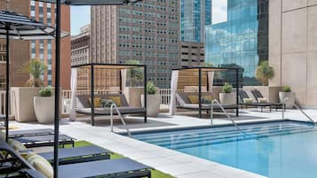 Outdoor pool, free cabanas, pool umbrellas