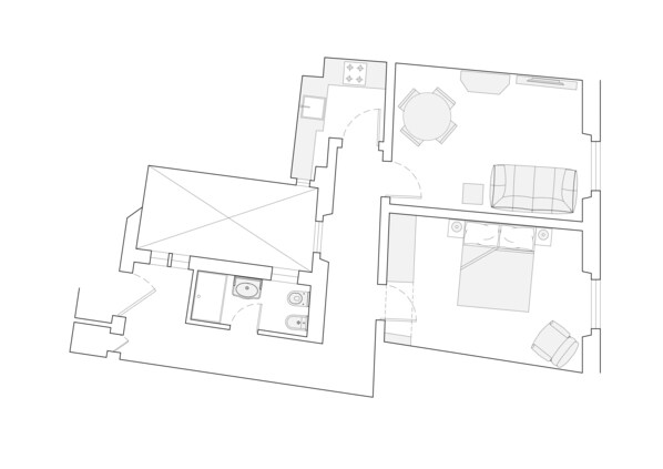 A floor plan with a kitchen, dining area, and two bedrooms.