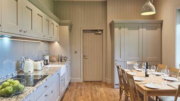Fridge, dishwasher, electric kettle, cookware/dishes/utensils