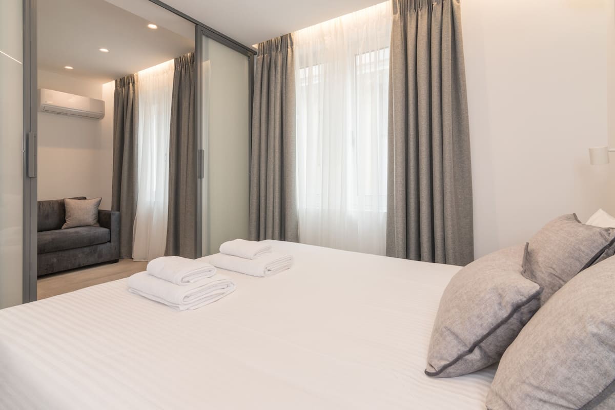 One-Bedroom Apartment | 1 bedroom, in-room safe, laptop workspace, blackout curtains