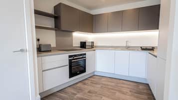 Apartemen, 2 kamar tidur | Dapur pribadi | Lemari es besar, microwave, oven, dan mesin pencuci piring