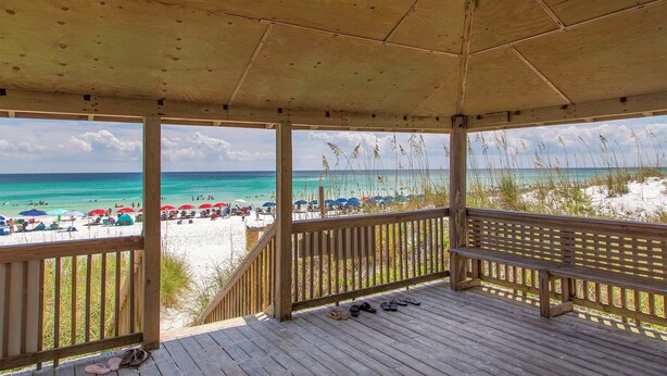 A wooden beach pavilion with a view of the beach and ocean. - Sea Cabins 11D - Updated Beachside Cabin, Swimming Pool, Private Beach Access! (Miramar Beach)