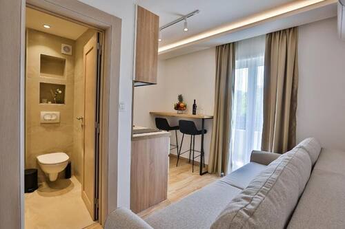 Apartament familiar | Sala d'estar | Televisor LCD de 32 polzades amb canals per cable