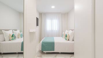 2 habitaciones, tabla de planchar con plancha, wifi y ropa de cama