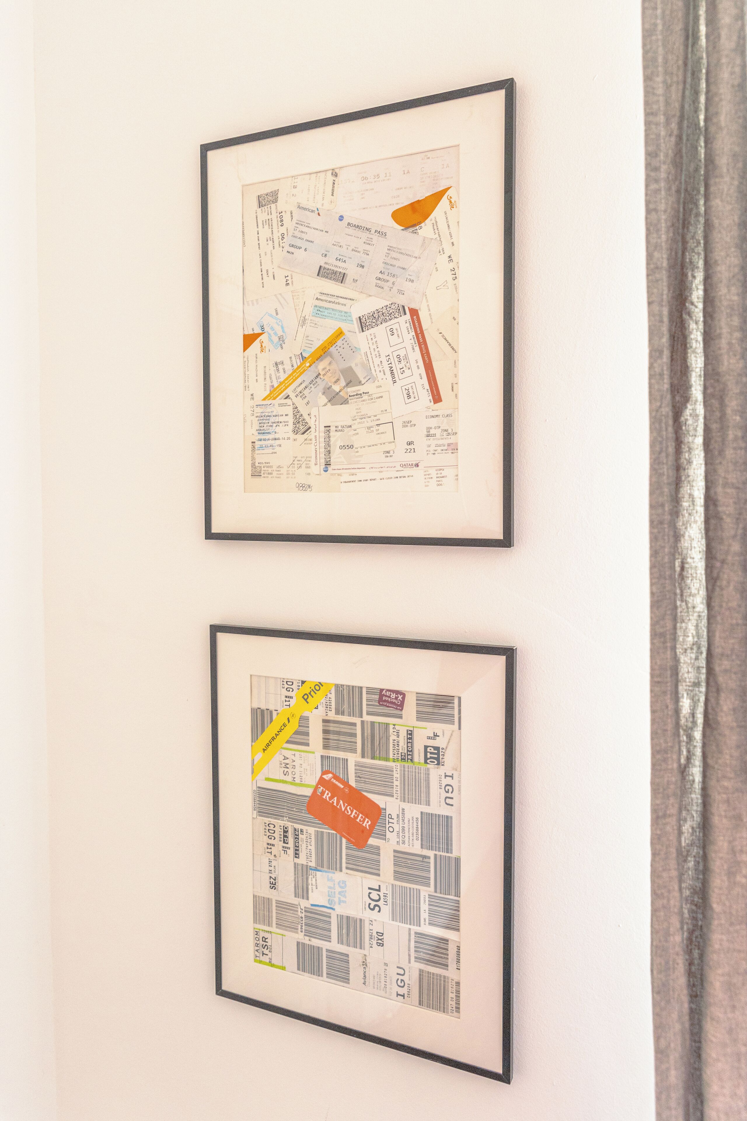 Two framed pictures of maps with labels and a transfer tag.