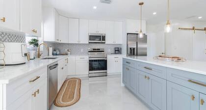 Gorgeous Waterfront Luxe Home w/ Heated Pool. Perfect Location!