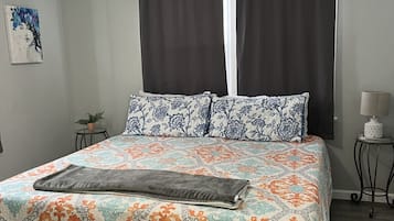 1 bedroom, desk, iron/ironing board, travel crib