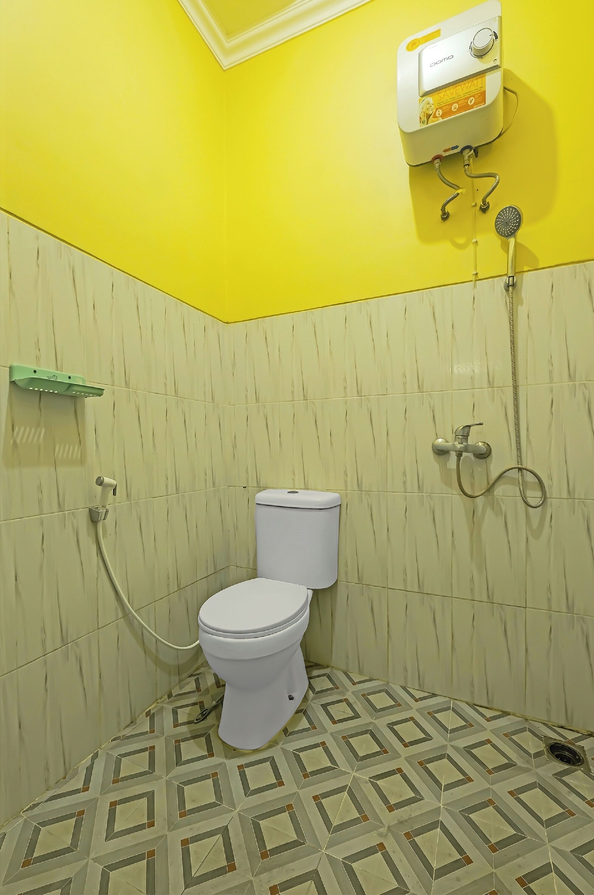 A small bathroom with a toilet, a shower, and a toilet paper holder.