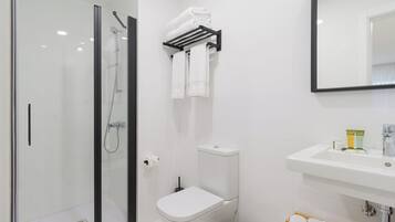 Hair dryer, towels, soap, toilet paper