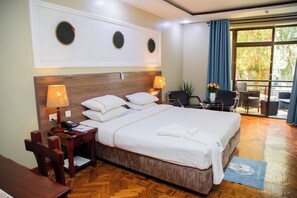 Habitación ejecutiva | Ropa de cama hipoalergénica y minibar 